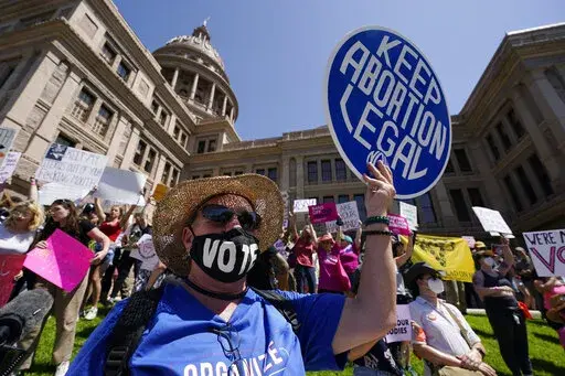 Abortion rights demonstrators attend a rally at the Texas Capitol, Saturday, May 14, 2022, in Austin, Texas. When a leaked draft decision signaled the end to federal protections for the right to an abortion in the U.S., donors clicked on donations buttons and mailed checks in a spasm of fury. The “rage giving” has given abortion funds a temporary financial boost.  (AP Photo/Eric Gay, File)