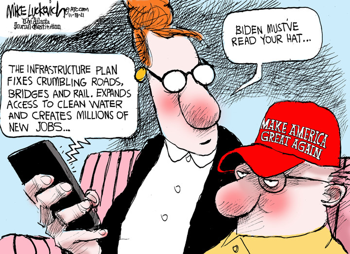 Mike Luckovich for Nov 18, 2021