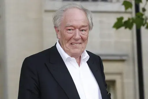 British actor Michael Gambon arrives in Trafalgar Square, in central London, for the world premiere of "Harry Potter and The Deathly Hallows: Part 2," the last film in the series, on July 7, 2011. Gambon, who was known to many for his portrayal of Hogwarts headmaster Albus Dumbledore in six of eight “Harry Potter” films, died. He was 82. A statement by his family, issued by his publicist on Thursday, Sept. 28, 2023, said he died following “a bout of pneumonia.” (AP Photo/Joel Ryan, File)