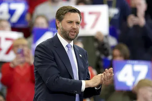 Republican vice presidential nominee Sen. JD Vance, R-Ohio, applauds the crowd after speaking at a campaign event at Penn State Behrend Erie Hall, Saturday, Oct. 26, 2024, in Erie, Pa. (AP Photo/Matt Freed)