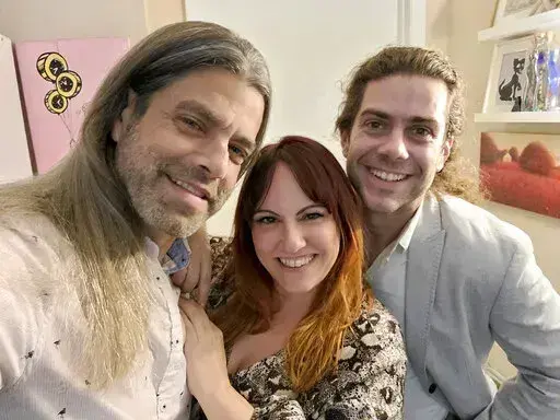 This image provided by Ryan Cohen shows, from left, Ryan Cohen, his wife, Emily Taffel, and Taffel's former boyfriend, Sam Rubman, on Feb. 3, 2022, in Coral Springs, Fla. In the era of intense cybersecurity and calls for multifactor lockdown of all things digital, the three share several logins to streaming services. (Ryan Cohen via AP).
