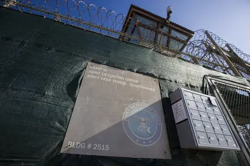 In this photo reviewed by U.S. military officials, the control tower of Camp VI detention facility is seen on April 17, 2019, in Guantanamo Bay Naval Base, Cuba. (AP Photo/Alex Brandon, File)