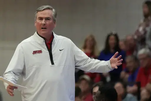 Western Kentucky head coach Rick Stansbury reacts to a referee's call during the second half of an NCAA college basketball game against Florida Atlantic, Jan. 28, 2023, in Boca Raton, Fla. Stansbury has resigned after seven seasons as Western Kentucky’s head coach and cited a need to focus on his health and family. (AP Photo/Rebecca Blackwell, File)
