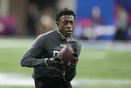 FILE -Mississippi State defensive back Emmanuel Forbes runs a drill at the NFL football scouting combine in Indianapolis, Friday, March 3, 2023. The Washington Commanders have selected Mississippi State cornerback Emmanuel Forbes with the 16th pick in the NFL draft, Thursday, April 27, 2023. (AP Photo/Darron Cummings, File)