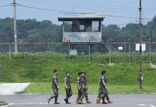 South Korean army soldiers pass by a military guard post at the Imjingak Pavilion in Paju, South Korea, near the border with North Korea, Wednesday, July 19, 2023. South Korea and the United States began large annual military exercises Monday, March 4, 2024, to bolster their readiness against North Korean nuclear threats after the North raised animosities with an extension of missile tests and belligerent rhetoric earlier this year.(AP Photo/Ahn Young-joon, File)