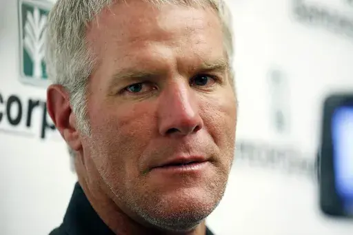Former NFL quarterback Brett Favre speaks with reporters prior to his induction to the Mississippi Hall of Fame in Jackson, Miss., Aug. 1, 2015. The civil lawsuit against Favre that seeks to recover misspent welfare money in Mississippi’s largest-ever public corruption case should be dismissed because the Mississippi Department of Human Services lacks evidence and is attempting to deflect from its own culpability, attorneys for Favre argue in new a court filing filed on Monday, April 3, 2023. 