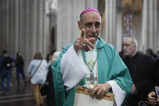 Victor Manuel Fernandez, then archbishop of La Plata, smiles after a Mass at the Cathedral in La Plata, Argentina, Sunday, July 9, 2023. The Vatican’s new doctrine chief, already under fire from entire bishops conferences for his approval of blessings for same-sex couples, is raising eyebrows anew over a book he wrote as a young priest describing orgasms in graphic terms. (AP Photo/Natacha Pisarenko, File)