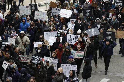 A crowd of over 300 people protest the killing of Patrick Lyoya in Grand Rapids, Mich., April 16, 2022. The 26-year-old Congolese refugee was fatally shot by a Grand Rapids police officer after resisting arrest during a traffic stop on April 4. (Eric Seals /Detroit Free Press via AP)
