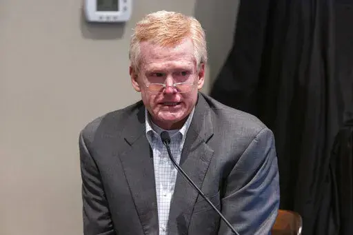 Defendant Alex Murdaugh is cross examined by prosecutor Creighton Waters while testifying during his murder trial at the Colleton County Courthouse in Walterboro, S.C., Friday, Feb. 24, 2023. The 54-year-old attorney is standing trial on two counts of murder in the shootings of his wife and son at their Colleton County, S.C., home and hunting lodge on June 7, 2021. (Joshua Boucher/The State via AP, Pool)