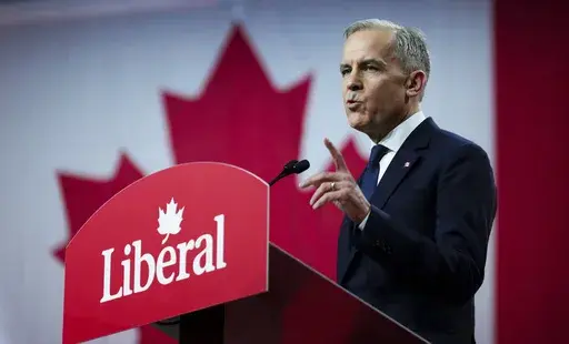 Liberal Party of Canada Leader Mark Carney delivers his speech after being announced as the winner of the party leadership at the announcement event in Ottawa, Ontario, Sunday, March 9, 2025. (Sean Kilpatrick/The Canadian Press via AP)