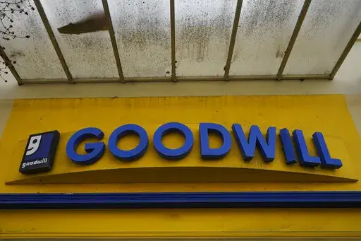 A Goodwill store sign is shown in Berkeley, Calif., Tuesday, March 9, 2021. Goodwill Industries International Inc., the 120 year-old non-profit organization that operates 3,300 stores in the U.S., and Canada,  has launched an online business, as part of a newly incorporated recommerce venture called GoodwillFinds. (AP Photo/Jeff Chiu, File)