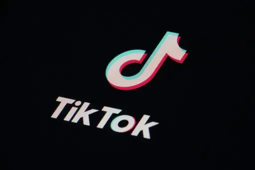 The icon for the video sharing TikTok app is seen on a smartphone, Tuesday, Feb. 28, 2023, in Marple Township, Pa. TikTok was dismissive Wednesday, March 15, of reports that the Biden administration was calling for its Chinese owners to sell their stakes in the popular video-sharing app, saying such a move wouldn't help protect national security. (AP Photo/Matt Slocum, File)