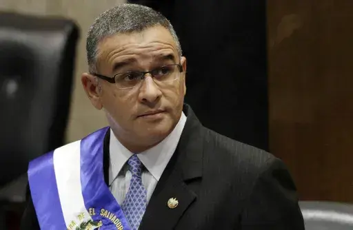 In this June 1, 2012 file photo, El Salvador's President Mauricio Funes stands in the National Assembly in San Salvador, El Salvador. Former El Salvador President Mauricio Funes, who spent the final years of his life in Nicaragua to avoid various criminal sentences, died late Tuesday. He was 65. (AP Photo/Luis Romero, File)