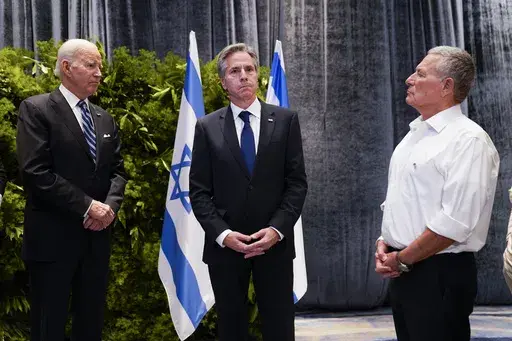 President Joe Biden and U.S. Secretary of State Antony Blinken, meet with victims' relatives and first responders who were directly affected by the Hamas attacks, Wednesday, Oct. 18, 2023, in Tel Aviv. (AP Photo/Evan Vucci)