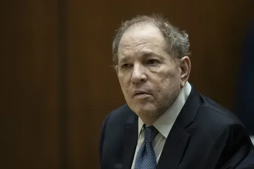 Former film producer Harvey Weinstein appears in court at the Clara Shortridge Foltz Criminal Justice Center in Los Angeles, Calif., on Oct. 4 2022. Los Angeles prosecutors say they will not retry Harvey Weinstein on rape and sexual assault charges involving two women. (Etienne Laurent/Pool Photo via AP, File)