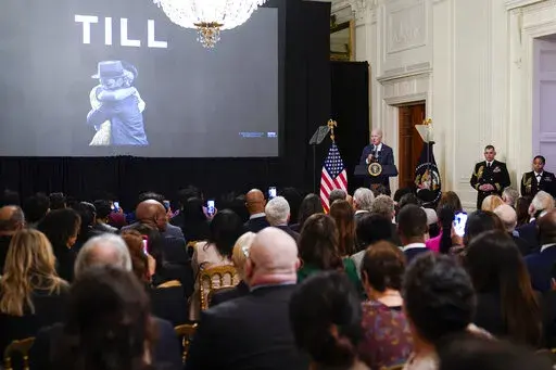 President Joe Biden speaks before the screening of the movie "Till" in the East Room of the White House in Washington, Thursday, Feb. 16, 2023. The movie, "Till," is the story of Mamie Till-Mobley who pursued justice after the lynching of her 14-year-old son, Emmett Till, in 1955. (AP Photo/Susan Walsh)
