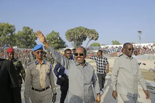 Somalia President Hassan Sheikh Mohamud leads a demonstration at Banadir stadium, Mogadishu, Thursday Jan. 12, 2023. The government rally encouraged an uprising against the al-Shabab group amid a month-long military offensive. The African Union appealed for nearly $90 million Wednesday, March 22, 2023, for its peacekeeping force in Somalia, which is providing support to its military forces battling al-Shabab extremists. (AP Photo/Farah Abdi Warsameh, File)