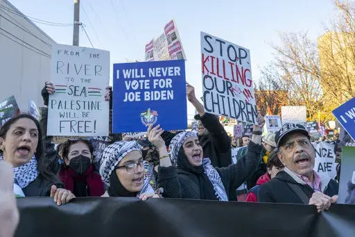 Around a thousand Palestinian and pro-Palestinian demonstrators rally at the corner of W. Hubbard St. and N. Armour St. near where President Joe Biden was attending a fundraising event in the West Town neighborhood of Chicago, Thursday, Nov. 9, 2023. Demonstrators were demanding that the President as well as national Democrats use their power to broker a ceasefire between Israel and Hamas whose conflict has killed thousands of civilians most of whom are Palestinian. (Tyler Pasciak LaRiviere/Chic