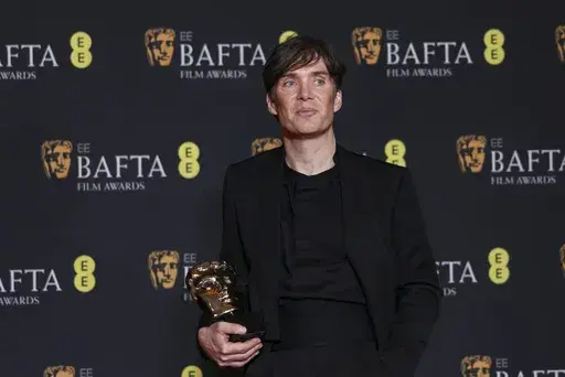 Cillian Murphy, winner of the leading actor award for 'Oppenheimer', poses for photographers at the 77th British Academy Film Awards, BAFTA's, in London, Sunday, Feb. 18, 2024. (Photo by Vianney Le Caer/Invision/AP)