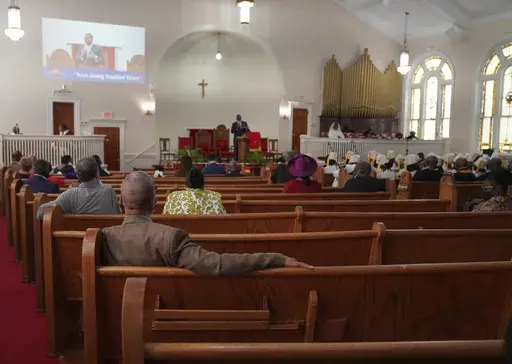 Congregants sit in largely empty pews during service at Zion Baptist Church, April 16, 2023, in Columbia, S.C. Post-pandemic burnout is at worrying levels among Christian clergy in the U.S., prompting many to think about abandoning their jobs, according to a new nationwide survey released Thursday, Jan. 11, 2024. (AP Photo/Jessie Wardarski, File)