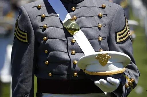 A Cadet listens during a commencement ceremony for the Class of 2020 on the parade field, at the United States Military Academy in West Point, N.Y., June 13, 2020. U.S. officials say reported sexual assaults at the U.S. military academies increased sharply during the 2020-2021 school year, as students returned to in-person classes amid the ongoing pandemic. The increase continues what officials believe is an upward trend at the academies, despite an influx of new sexual assault prevention and tr