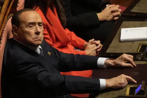 Forza Italia's president Silvio Berlusconi takes his seat in the Italian Senate on the opening session of the new parliament, Thursday, Oct. 13, 2022. Doctors for Italian former Premier Silvio Berlusconi say he is being treated in hospital for a lung infection that is a result of chronic leukemia. Berlusconi’s personal physician, Alberto Zangrillo, signed off on a medical bulletin issued Thursday, April 6, 2023 afternoon that said Berlusconi “has had for some time” leukemia in a “persist