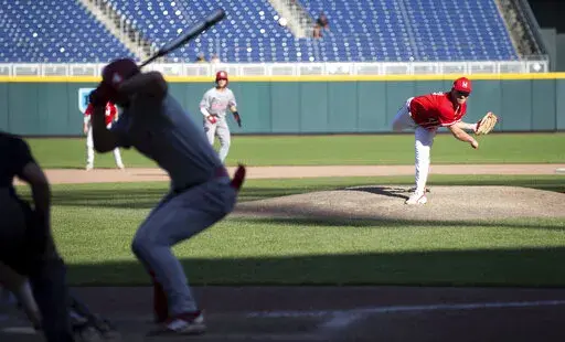 Maryland's Will Glock pitches in the 11th inning against Indiana during a Big Ten college baseball tournament game Saturday, May 28, 2022, in Omaha, Neb. (Megan Nielsen/Omaha World-Herald via AP)
