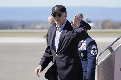 President Joe Biden waves as he arrives Air Force One, Tuesday, March 29, 2024, in Hagerstown, Md. Biden is en route to Camp David.(AP Photo/Alex Brandon)