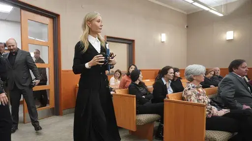 Gwyneth Paltrow enters the courtroom for her trial, Monday, March 27, 2023, in Park City, Utah. The man suing Gwyneth Paltrow over a 2016 skiing collision at one of the most upscale resorts in North America took the stand Monday, saying he was rammed into from behind and sent “absolutely flying.” (AP Photo/Rick Bowmer, Pool)