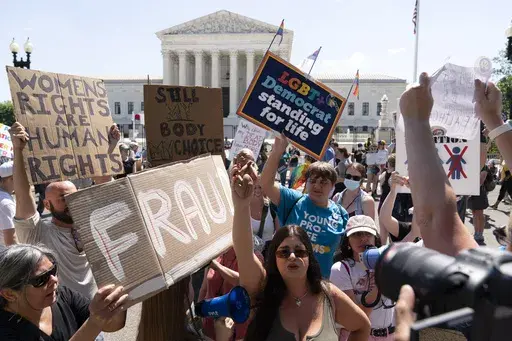 Anti-abortion demonstrators and abortion rights activists protest outside the Supreme Court in Washington, Saturday, June 25, 2022. More than a year after the Supreme Court overturned the federal right to abortion, the issue has at times dominated the discussion among the Republicans seeking their party’s 2024 presidential nomination. (AP Photo/Jose Luis Magana, File)