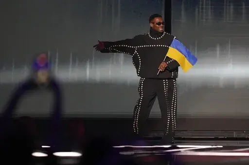 Tvorchi of Ukraine is introduced during dress rehearsals for the Grand final at the Eurovision Song Contest in Liverpool, England, Friday, May 12, 2023. (AP Photo/Martin Meissner)