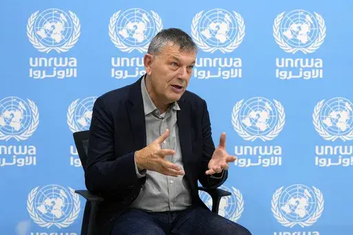 The Commissioner-General of the U.N. agency for Palestinian refugees, Philippe Lazzarini, speaks during an interview with The Associated Press at the UNRWA headquarters in Beirut, Lebanon, Wednesday, Dec. 6, 2023.The head of the main United Nations agency supporting people in Gaza alleges that Israel is intent on “destroying” it along with the idea that Palestinians are refugees and have a right one day to return home. Philippe Lazzarini in an interview with a Swiss newspaper accuses Israel 