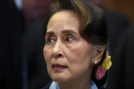 Myanmar's leader Aung San Suu Kyi waits to address judges of the International Court of Justice in The Hague, Netherlands, Dec. 11, 2019. A court in military-ruled Myanmar convicted former leader Aung San Suu Kyi in another criminal case Thursday, Sept. 29, 2022, and sentenced Australian economist Sean Turnell to three years in prison for violating an official secrets law, a legal official said. (AP Photo/Peter Dejong, File)
