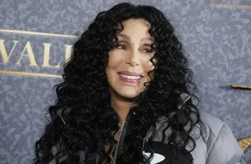 Cher arrives at the premiere of "Chevalier" in Los Angeles on rApril 16, 2023. Cher's holiday album, “Christmas,” releases Friday. (Photo by Jordan Strauss/Invision/AP, Filer)