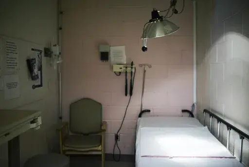 A hospital exam room is seen in Alabama on Thursday, July 30, 2015. A large Swedish study, published Wednesday, Dec. 13, 2023, in JAMA Psychiatry, has uncovered a paradox about people diagnosed with an excessive fear of serious illness: They tend to die earlier than people who aren’t hypervigilant about health concerns. (AP Photo/Brynn Anderson, File)