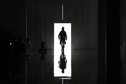 A model wears a creation as part of the men's Dsquared2 Fall-Winter 2024-2025 collection, that was presented in Milan, Italy, Friday, Jan. 12, 2024. (AP Photo/Antonio Calanni).