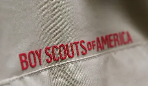A Boy Scout uniform is displayed, Feb. 18, 2020, in the retail store at the headquarters for the French Creek Council of the Boy Scouts of America in Summit Township, Erie County, Pa. The U.S. organization, which now welcomes girls into the program and allows them to work toward the coveted Eagle Scout rank, announced Tuesday, May 7, 2024, that it will change its name to Scouting America as it focuses on inclusion. (Christopher Millette/Erie Times-News via AP, File)