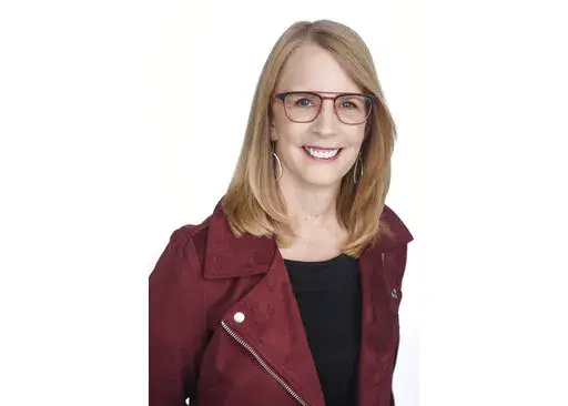 This undated file photo provided by NerdWallet shows Liz Weston, a columnist for personal finance website NerdWallet.com. Accessory dwelling units, or ADUs, are separate living spaces added to an existing home — typically on a single-family residential lot. That addition could include a converted basement or backyard cottage. ADUs can house older family members, provide lodging for young adult family members or serve as a source of rental income. Despite their utility, ADUs aren’t allowed in