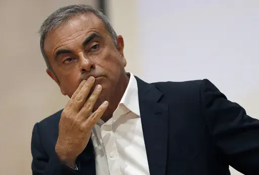 Former Nissan Motor Co. Chairman Carlos Ghosn holds a press conference at the Maronite Christian Holy Spirit University of Kaslik, in Kaslik, north of Beirut, Lebanon, on Sept. 29, 2020. A Lebanese judge on Monday June 19, 2023, questioned auto tycoon Carlos Ghosn in Beirut over possible links to a former French Cabinet minister who was charged two years ago for dealing with him, officials familiar with the case said. (AP Photo/Hussein Malla, File)