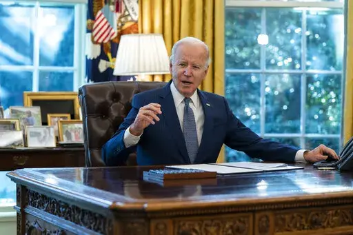 President Joe Biden speaks before signing an executive order to improve government services, in the Oval Office of the White House, Dec. 13, 2021, in Washington. Biden’s long arc in public life has always had one final ambition: to sit behind the Resolute Desk of the Oval Office. He achieved it, albeit at 78 the oldest person to assume the presidency. (AP Photo/Evan Vucci, File)