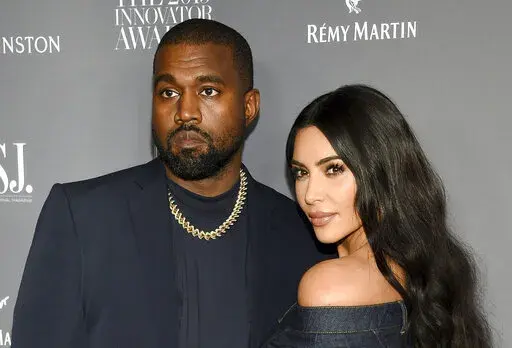 Kanye West, left, and Kim Kardashian attend the WSJ. Magazine Innovator Awards on Nov. 6, 2019, in New York. Kardashian and Ye, who legally changed his name from Kanye West, have reached a settlement in their divorce, averting a trial that had been set for next month, court documents filed Tuesday, Nov. 29, 2022, showed. (Photo by Evan Agostini/Invision/AP, File)