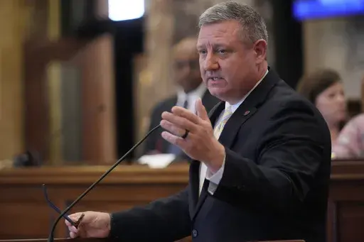 Mississippi State Education Committee Chairman Sen. Dennis DeBar, R-Leakesville, explains his opposition to a revised education bill in the Senate chamber, Tuesday, April 9, 2024, at the Mississippi Capitol in Jackson, Miss. (AP Photo/Rogelio V. Solis)