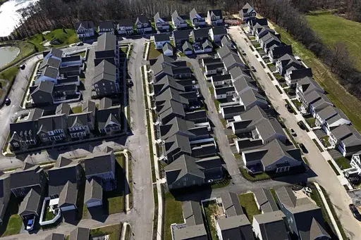 This aerial photo shows a housing development in Cranberry Township, Pa., March 29, 2024. (AP Photo/Gene J. Puskar, File)