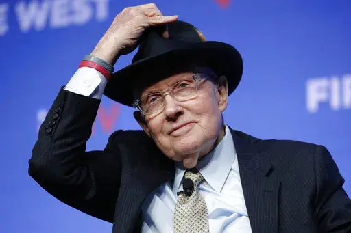 Former Senate Majority Leader Harry Reid tips his hat during a fundraiser for the Nevada Democratic Party in Las Vegas, Nov. 17, 2019. Reid, who was the Senate majority leader from 2007 to 2015, helped pool resources to maximize support for candidates up and down the ballot. Reid died on Dec. 28, 2021. (AP Photo/John Locher, File)