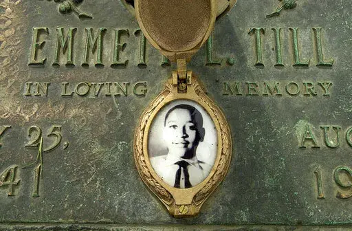 In this May 4, 2005 file photo, Emmett Till's photo is seen on his grave marker in Alsip, Ill. Legislation that would make lynching a federal hate crime in the U.S. is expected to be signed into law next week by President Joe Biden. The Emmett Till Anti-Lynching Act was years in the making. (Robert A. Davis/Chicago Sun-Times via AP, File)