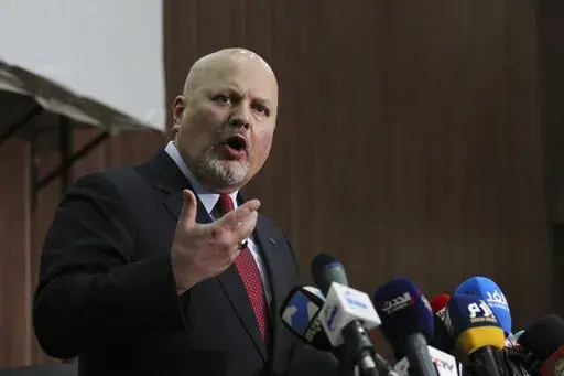Karim Ahmed Khan, International Criminal Court chief prosecutor, speaks during a news conference at the Ministry of Justice in the Khartoum, Sudan, Aug. 12, 2021. Representatives of a group of nations working together to investigate war crimes committed since Russia's invasion of Ukraine are meeting Tuesday, May 31, 2022 in The Hague amid ongoing calls for those responsible for atrocities to be brought to justice. Tuesday's coordination meeting at the European Union's judicial cooperation agency
