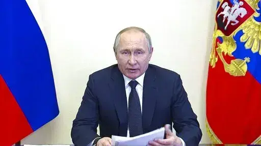 In this photo taken from video released by the Russian Presidential Press Service, Russian President Vladimir Putin speaks via videoconference at the Novo-Ogaryovo residence outside Moscow, Russia, Wednesday, March 16, 2022. (Russian Presidential Press Service via AP, File)