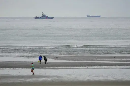 A vessel of the French Gendarmerie Nationale patrols in front of the Wimereux beach, France, Wednesday, Sept. 4, 2024. (AP Photo/Nicholas Garriga, File)