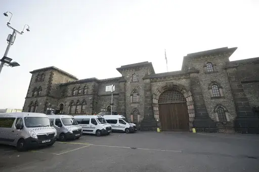 A general view of HMP Wandsworth in London where a British soldier awaiting trial on terror-related charges has escaped from a prison in southwest London Wednesday, Sept. 6, 2023 and police have launched an urgent manhunt. Counterterror police say Daniel Abed Khalife went missing from Wandsworth Prison early Wednesday. (Yui Mok/PA via AP)