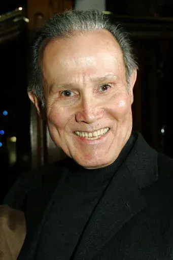 Actor Henry Silva is photographed during fellow actor Ernest Borgnine's 90th birthday party at a restaurant in Los Angeles, on Jan. 24, 2007. Silva, a prolific character actor best known for playing villains and tough guys in “The Manchurian Candidate,” “Ocean's Eleven” and other films, has died at age 95. Silva's son Scott Silva told Variety that he died Wednesday, Sept. 14, 2022, of natural causes at the Motion Picture and Television Country House and Hospital in Woodland Hills, Calif.